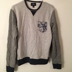 American Eagle sweater with floral pocket